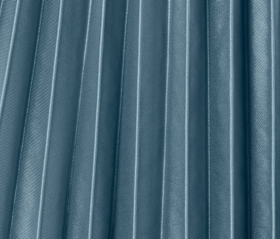 Detail plisované sukně.