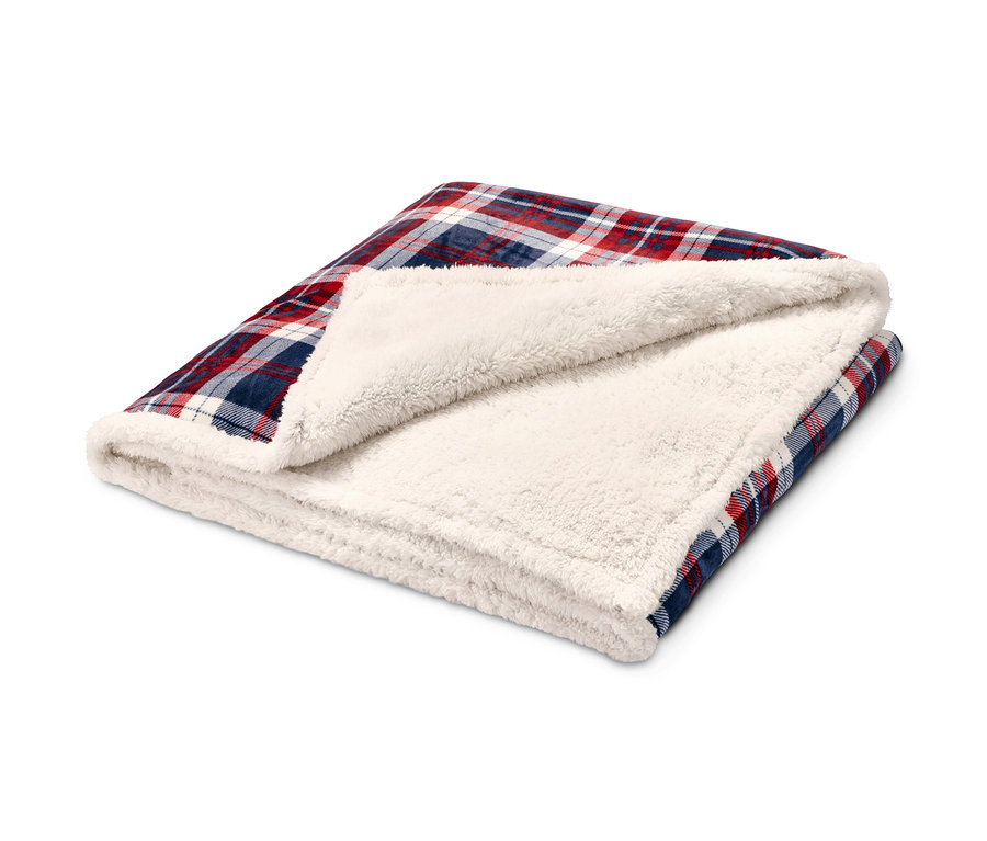 Složená měkoučká oboustranná deka s kostkovaným vzorem a sherpa podšívkou.