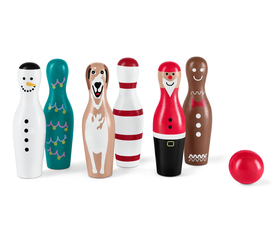 Sada mini bowling Xmas s kolky ve tvaru sněhuláka, stromečku, psa, červenobílých pruhů, Santy Clause a perníkového muže a červenou koulí.