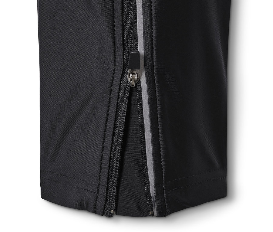 Detail cyklistických kalhot s rozepnutým zipem.