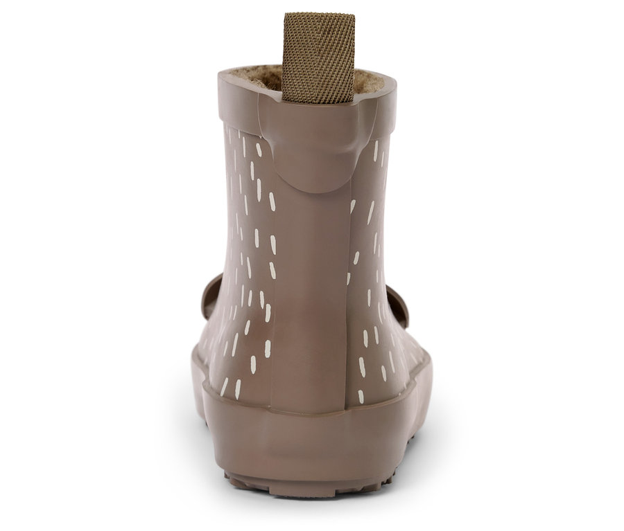 Béžová gumová bota s bílými svislými pruhy a hnědým látkovým poutkem zezadu.