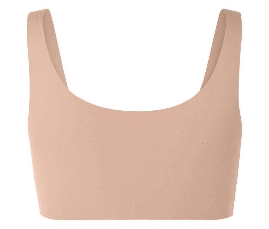 Broskvový sportovní top se širokými ramínky.