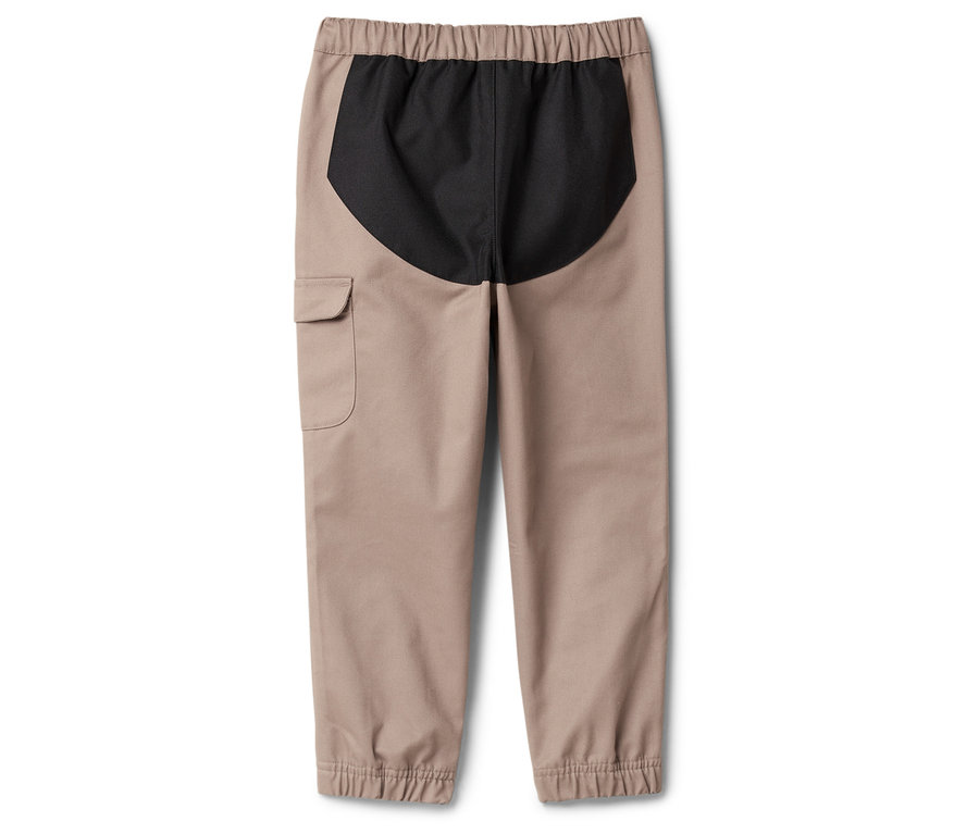 Béžové kalhoty s elastickým pasem a černou vsadkou vzadu.