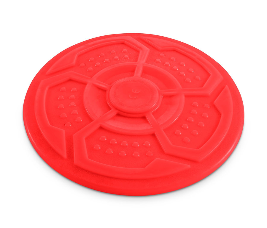 Červený létající talíř pro psy na bílém pozadí.