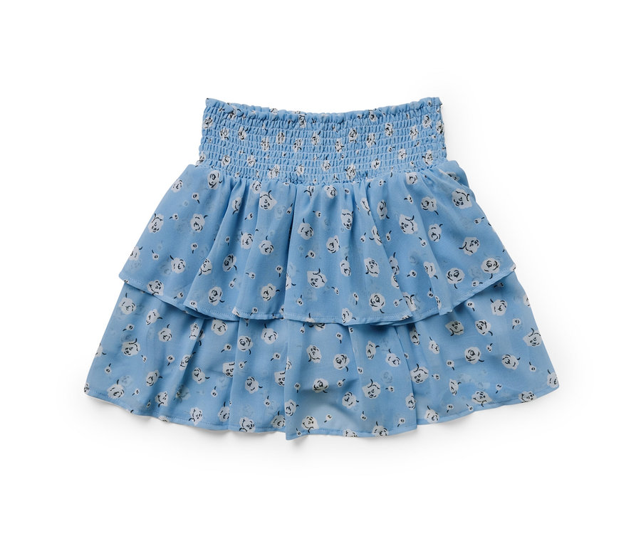 Modrá dívčí stupňovitá sukně s květinovým vzorem.