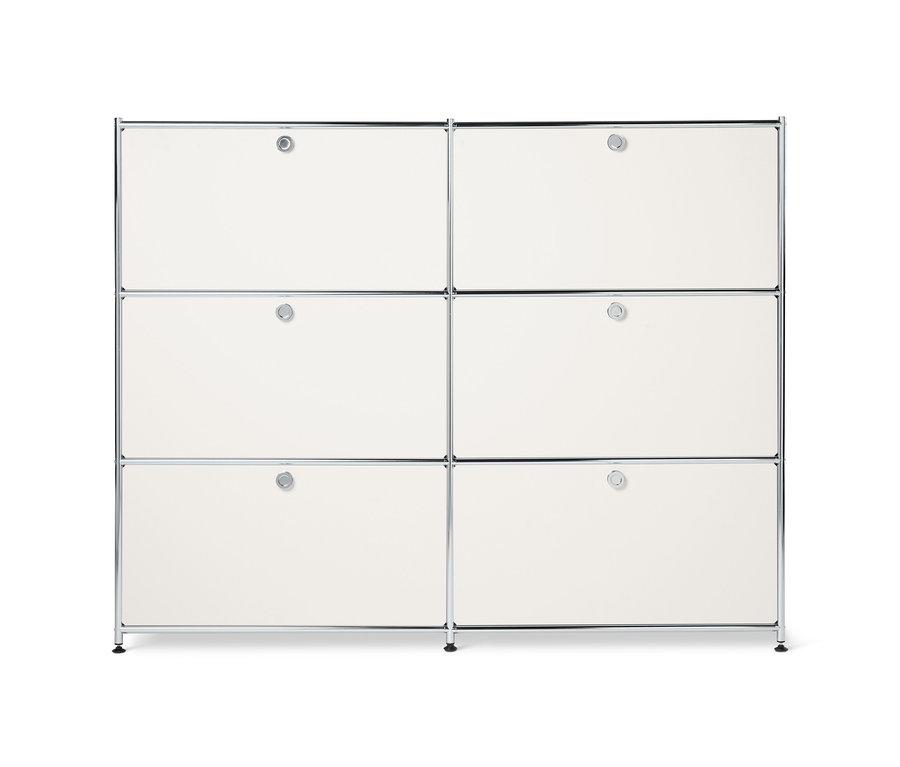 Bílá kovová komoda CN3 se šesti výklopnými dvířky.