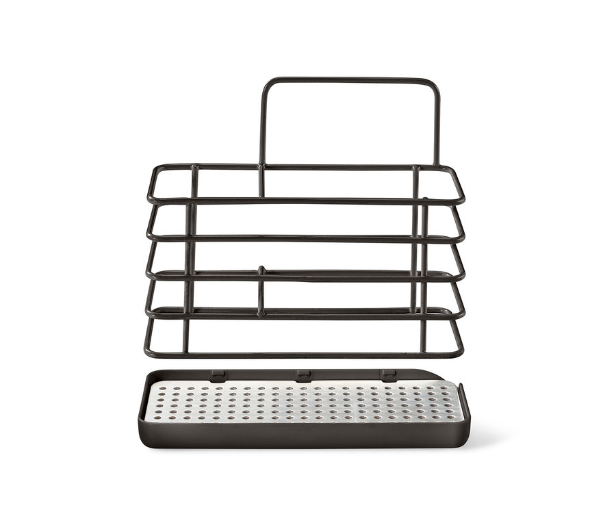 Kovový stojan na mycí potřeby se stříbrnou odkapávací miskou.