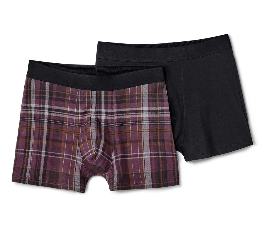 Dvoje boxerky: jedny kostkované a jedny černé.
