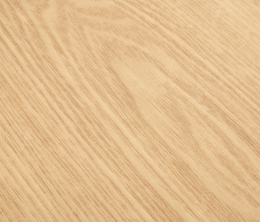 Detailní záběr textury světlého dřeva.