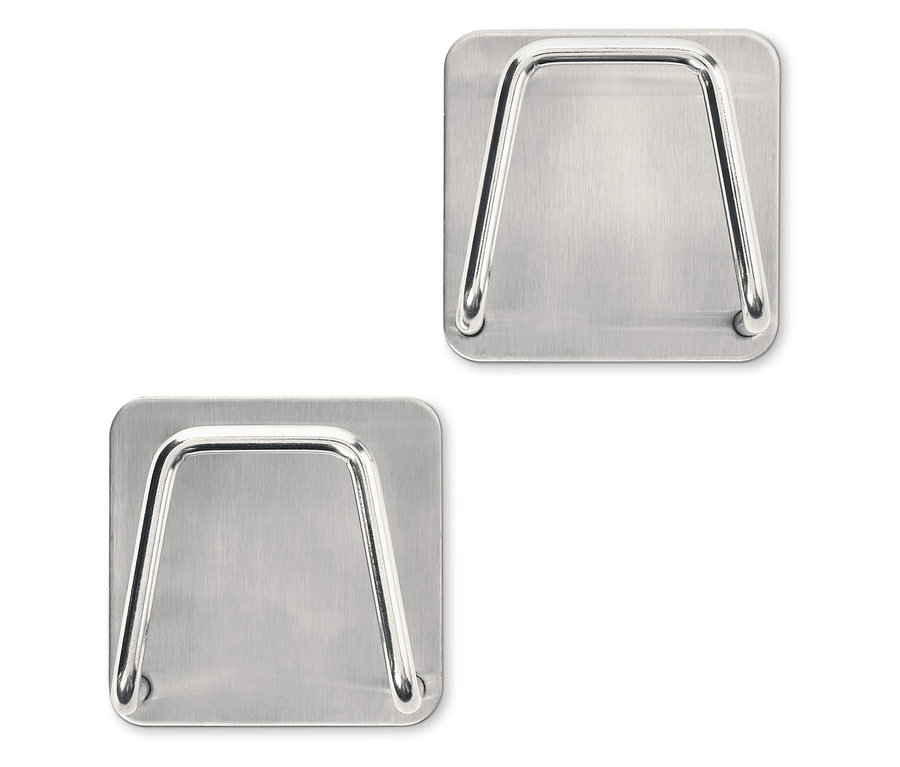 Dva držáky na houbičky z nerezové oceli.