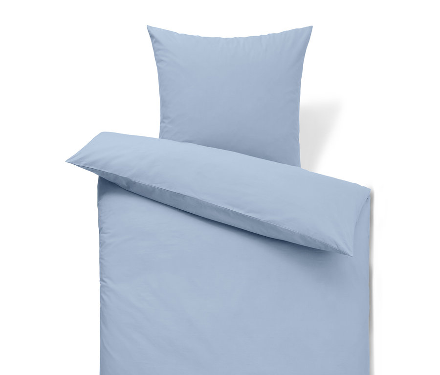 Světle modrá sada povlečení s polštářem.
