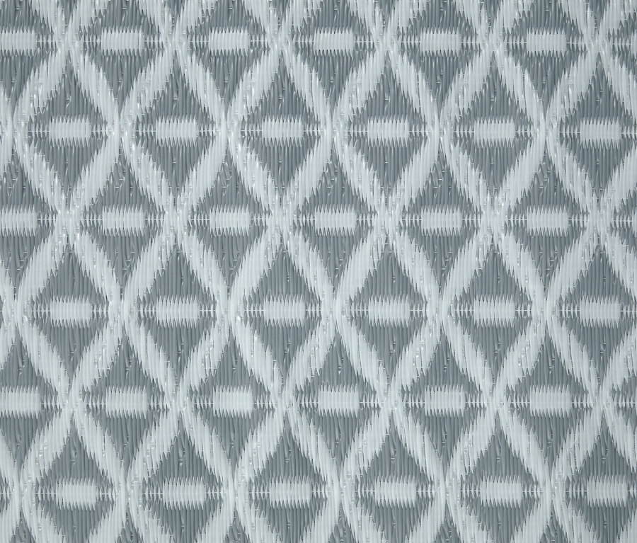 Vzorovaný venkovní koberec.