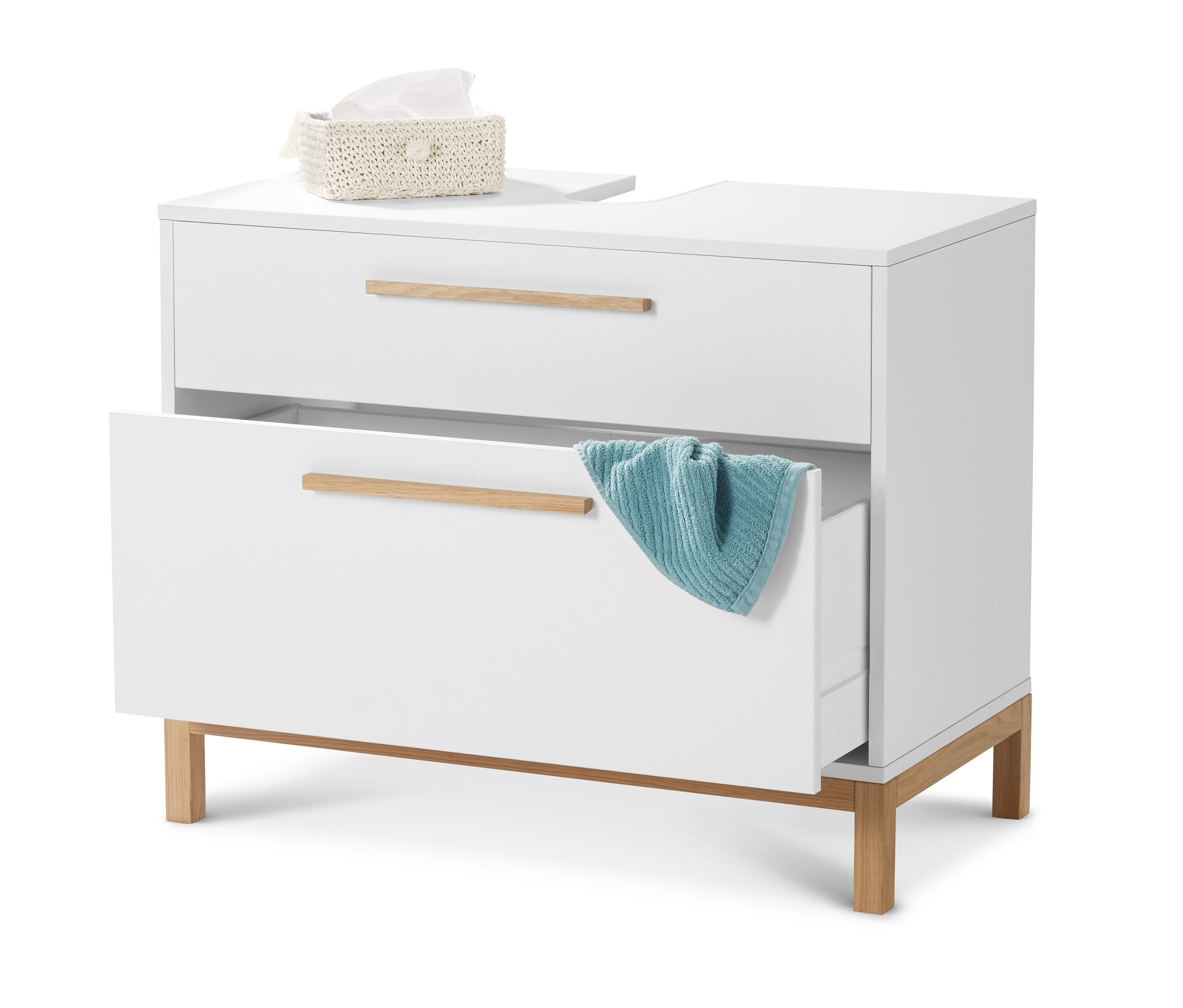 Bílá skříňka pod umyvadlo »Eklund« se 2 zásuvkami, jedna zásuvka je otevřená a je v ní modrý ručník. Nahoře leží krabička s papírovými kapesníky.