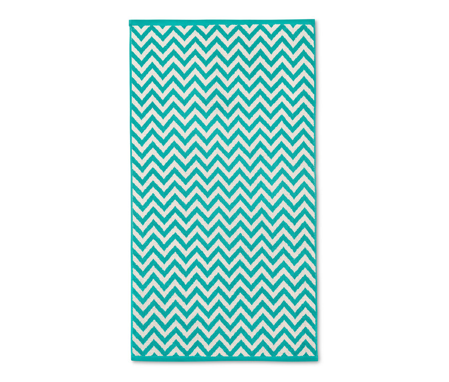 Modrozelená žakárová osuška s cikcak vzorem.