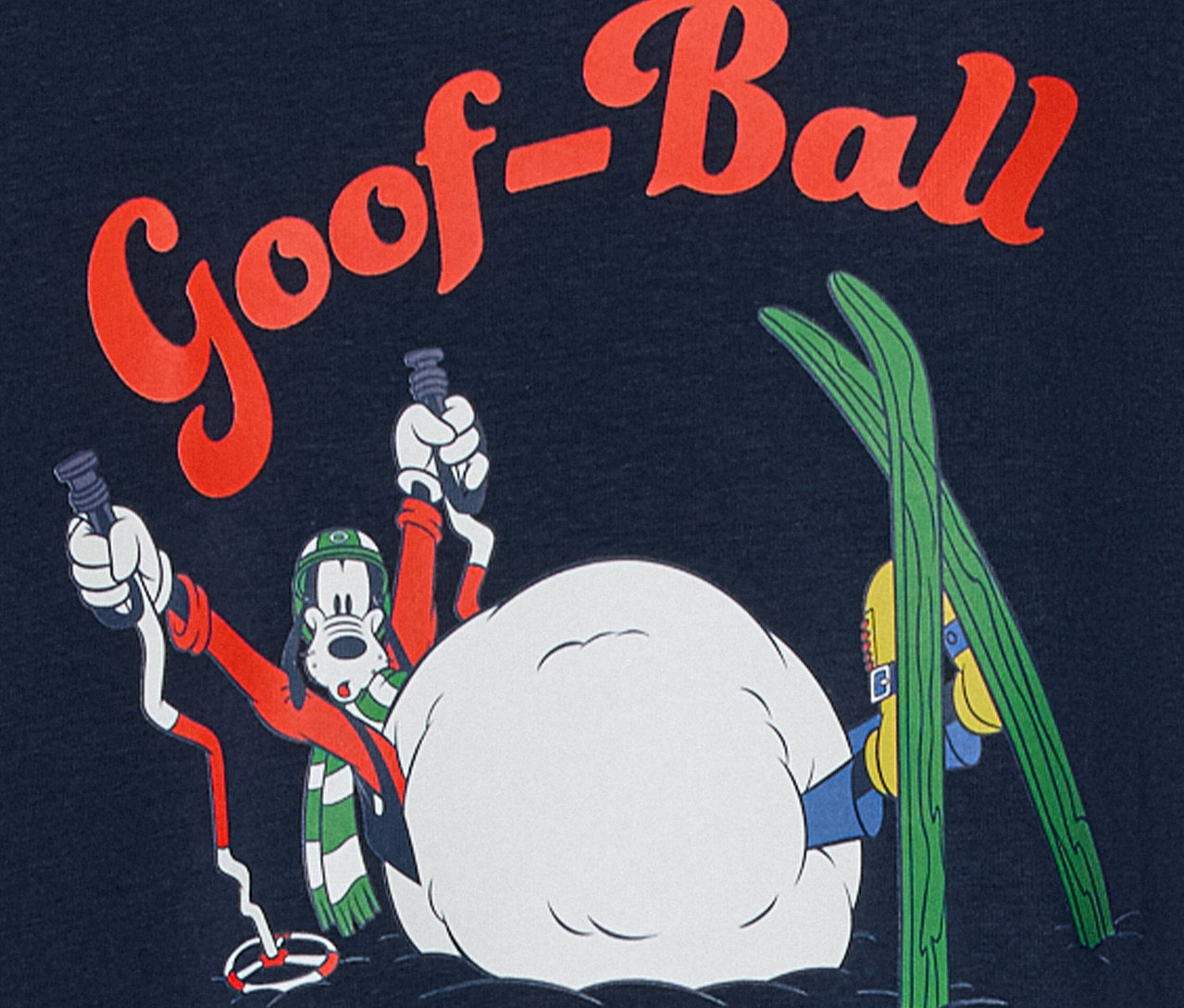 Kreslená postavička Goofy s lyžařskou výbavou v zasněžené scéně s nápisem "Goof-Ball".