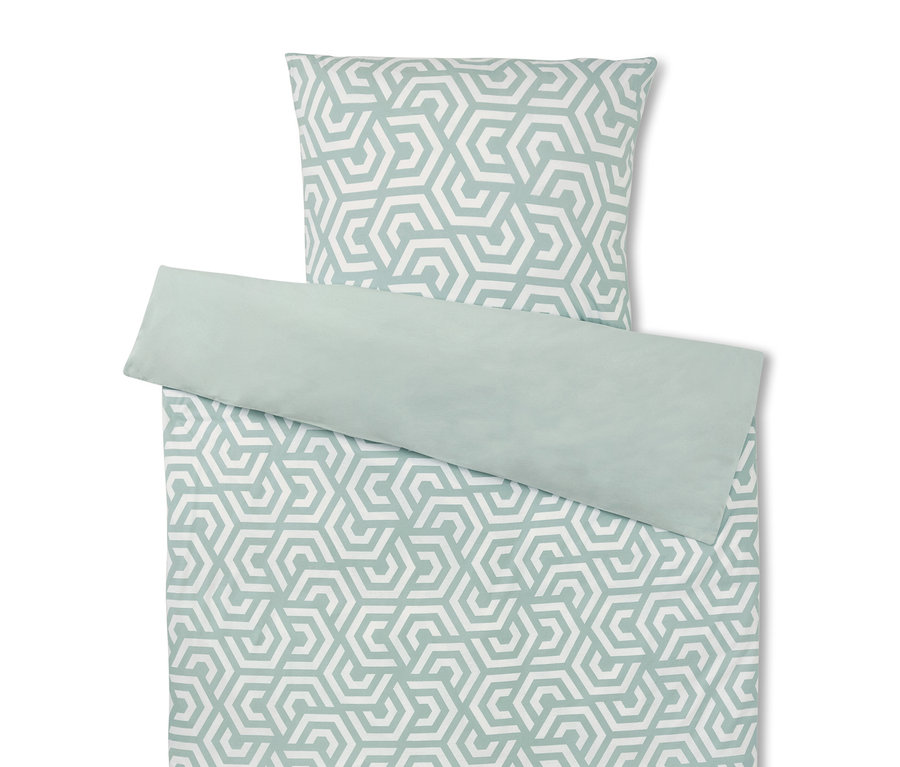 Sada povlečení s geometrickým vzorem v bílé a zelené barvě.