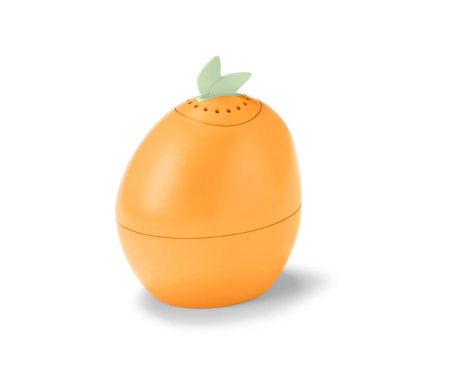 Oranžový čistič na mikrovlnné trouby ve tvaru vejce s lístky nahoře.