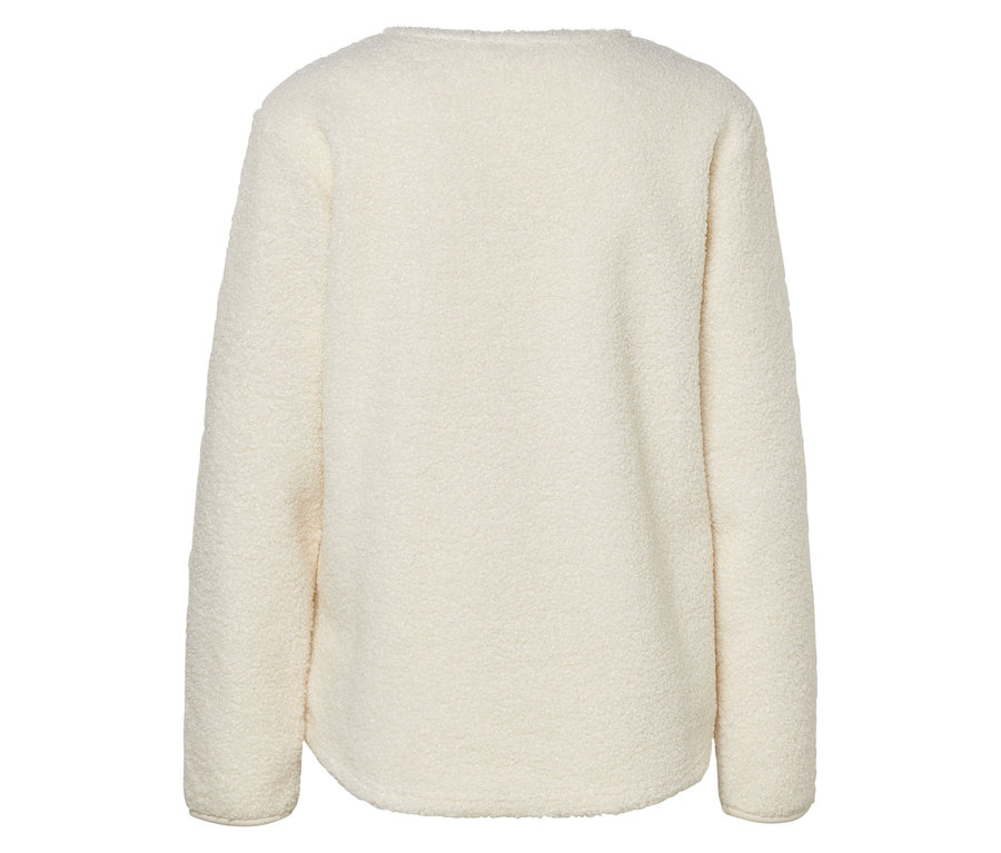 Detail zadní strany krémové mikiny s dlouhým rukávem.