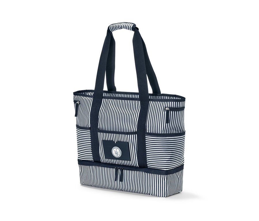 Pruhovaná plážová taška s modrými detaily.