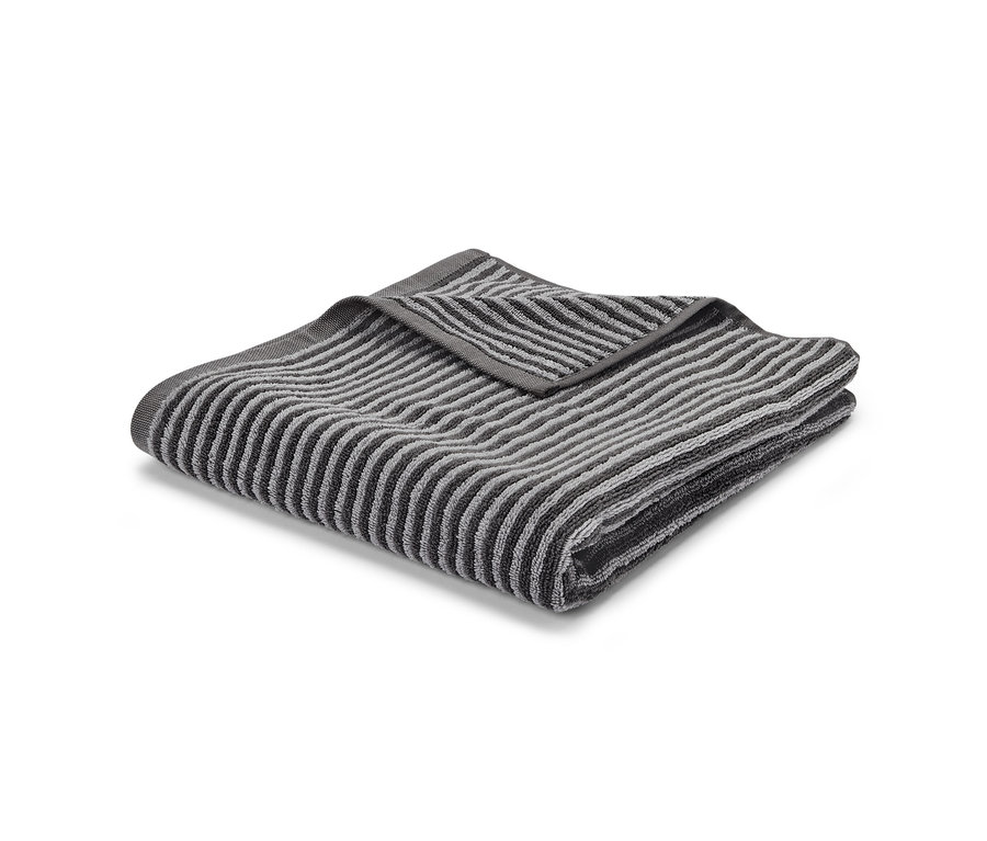Složená kvalitní šedá osuška.
