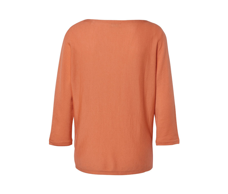 Broskvový svetr z jemného úpletu merino.