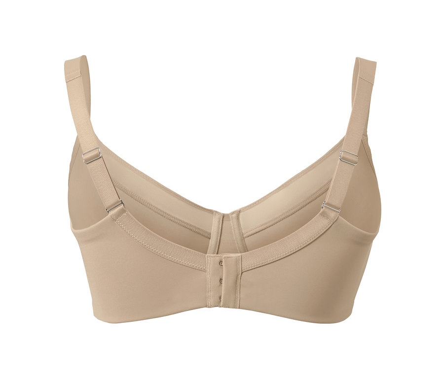 Detailní pohled zezadu na béžovou zmenšující podprsenku.