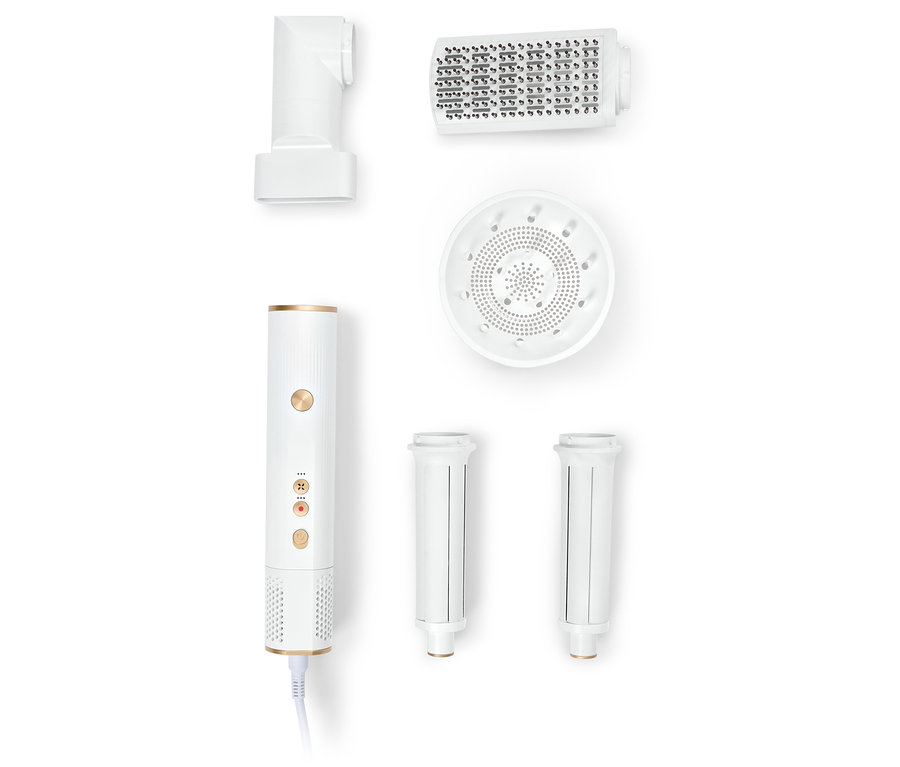 Bílé multifunkční zařízení na úpravu vlasů s různými nástavci.