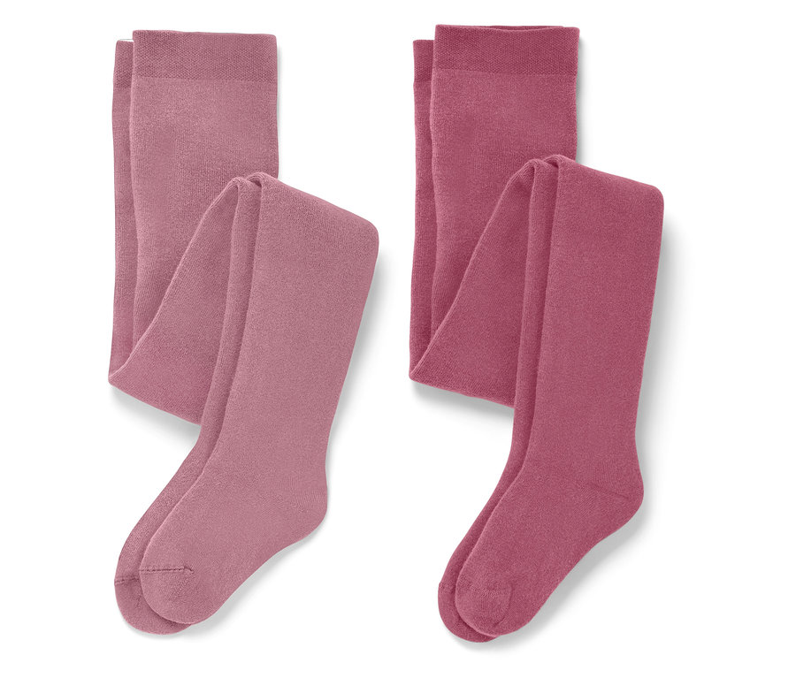 Dvoje složené punčocháče v odstínech růžové.