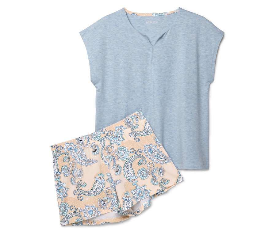 Světle modrý pyžamový top a šortky s potiskem tlapek leží na bílém pozadí.