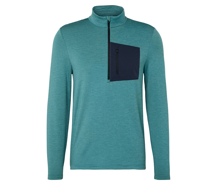 Tyrkysové melírované triko s dlouhým rukávem, krátkým zipem a tmavě modrou kapsou na levé straně hrudi.