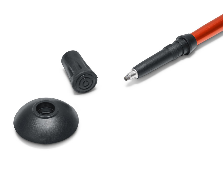 Část skládací trekingové hole a dva nástavce.