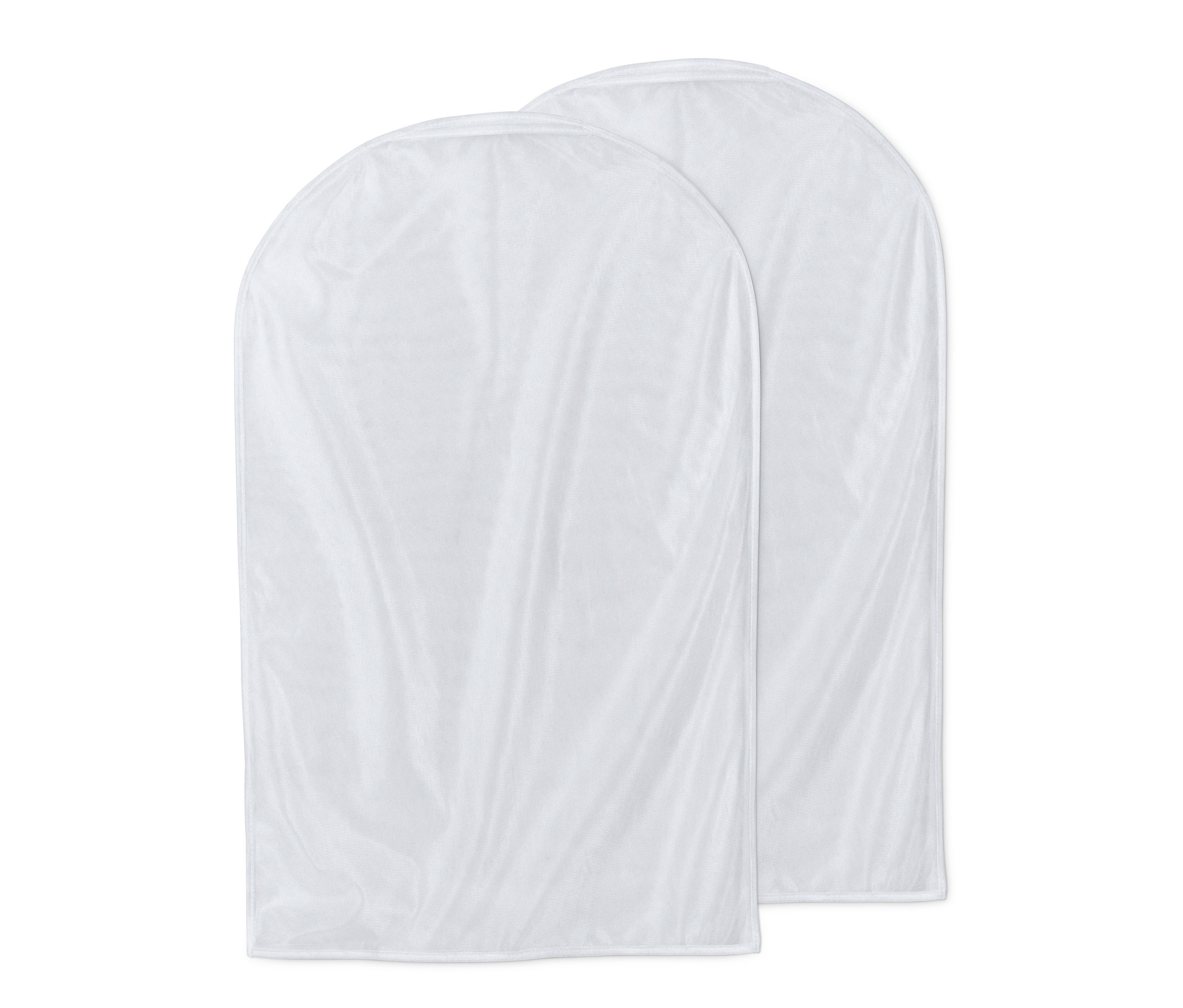 Dva bílé ochranné obaly na šaty.