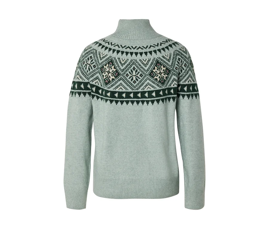 Světle zelený rolák s tmavě zeleným, bílým a světle zeleným vzorem Fair Isle na ramenou a hrudi, s geometrickými tvary a motivy sněhových vloček. Žebrované manžety a lem.